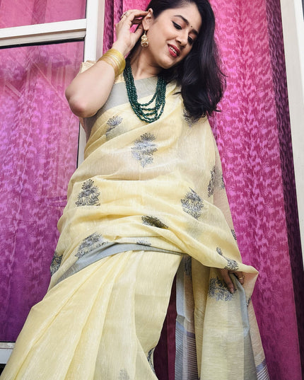 Yellow Butter - Tissue Linen Saree with Zari border